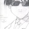 Yamaki in suit with glasses